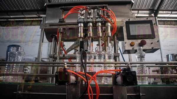 mesin filling piston otomatis